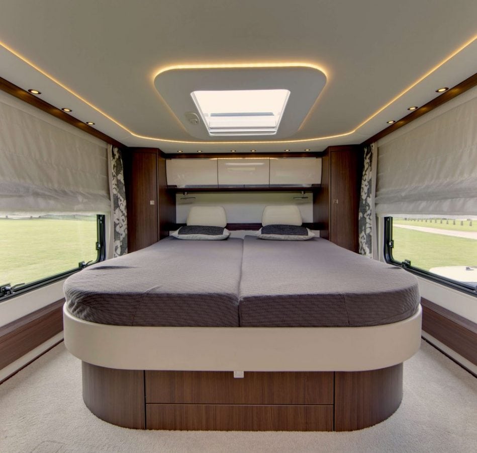 The Morelo Empire Liner motor home. See SWNS copy SWMOTOR: A motorhome firm has unveiled a palace on wheels which costs almost twice as much as the average English house. The Morelo Empire Liner has underfloor heating, a rain shower, double bedroom and even a garage. It is powered by a 7.7-litre engine which develops 300bhp a twice as much torque as a Lamborghini Aventador. The motorhome, described as a “super-liner”, has a whopping £378,200 price-tag, which is almost twice the price of the average home in England. It has a large panoramic roof which you look up at from the spacious double bed.