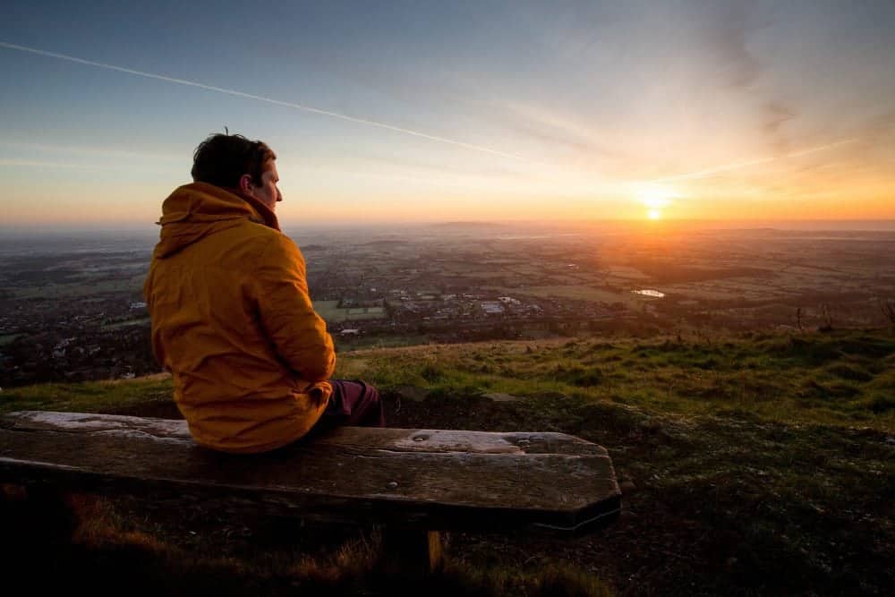 People watch a stunning winter sunrise over the Malvern Hills in Worcestershire. Although recent days have been mild for this time of year, a cold snap is expected to arrive in the next few days. December 27 2016.