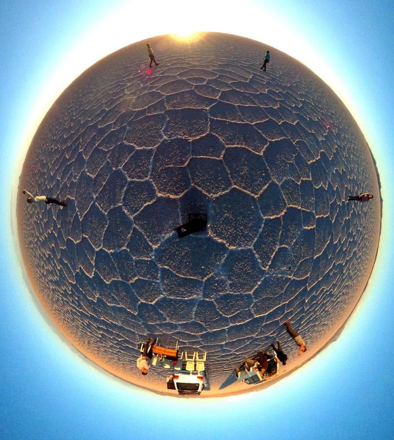 One of Lee Thompson's ’Surroundies’ on theUyuni salt flats in Bolivia. See SWNS story SWSURROUND; A daredevil photographer who captured the ultimate selfie at the top of the Christ The Redeemer statue now plans to better it by taking a "surroundie". Lee Thompson, 34, has spent the last three months travelling around the world shooting incredible pictures on his Samsung's Gear 360. He has so far taken shots in Bolivia, Peru, India, Finland, and Sri Lanka as part of a marketing campaign for his company, Flash Pack. But the travel boss has his own wish list with top spot being taking a surroundie on top of the iconic Christ The Redeemer monument in Rio de Janeiro.