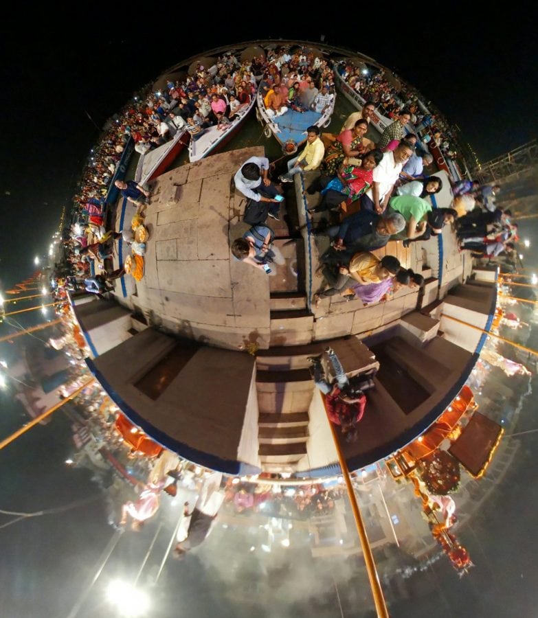 One of Lee Thompson's ’Surroundies’ on the river Ganges in Varanasi India. See SWNS story SWSURROUND; A daredevil photographer who captured the ultimate selfie at the top of the Christ The Redeemer statue now plans to better it by taking a "surroundie". Lee Thompson, 34, has spent the last three months travelling around the world shooting incredible pictures on his Samsung's Gear 360. He has so far taken shots in Bolivia, Peru, India, Finland, and Sri Lanka as part of a marketing campaign for his company, Flash Pack. But the travel boss has his own wish list with top spot being taking a surroundie on top of the iconic Christ The Redeemer monument in Rio de Janeiro.