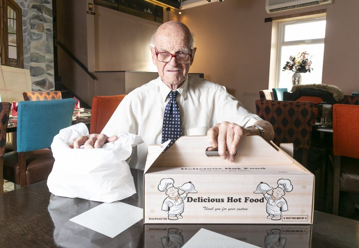 Britain’s oldest takeaway driver delivers curries in a SUIT AND TIE