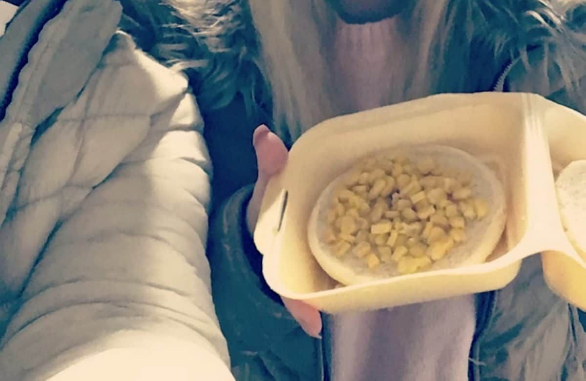 Couple order corn on the cob…and get a bread roll filled with sweetcorn