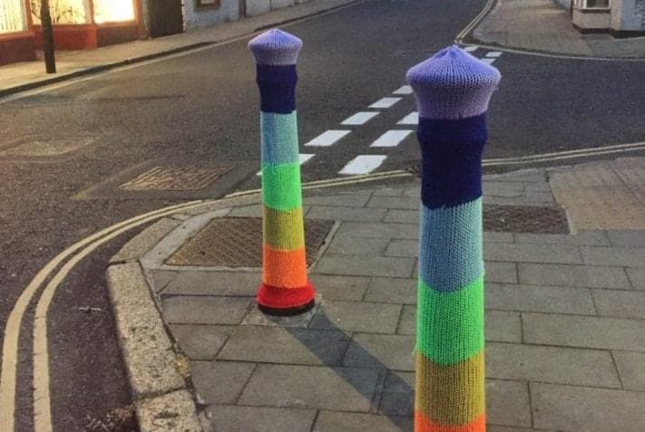 Police investigate hate crime after two ‘yarn-bombing’ crochet bollard torn down – celebrating gay pride