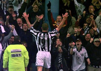 This picture can only be used within the context of an editorial feature. Newcastle United captain Alan Shearer celebrates with the fans after scoring Newcastle's second goal against Sheffield Wednesday during their FA Premiership match at Hillsborough.   * Final Score: Sheffield Wednesday 0  Newcastle United 2.