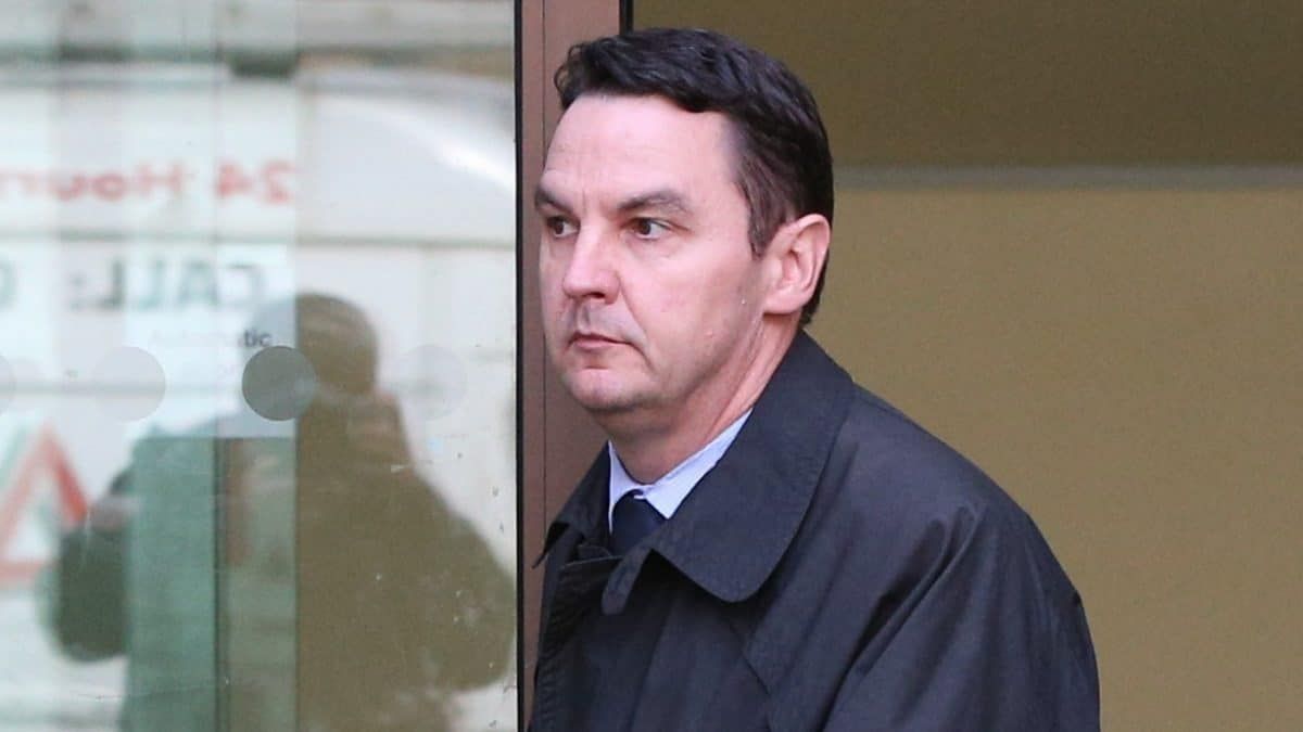 Lawyer convicted of upskirting shouts ‘leave me alone’ to photographers outside court