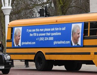 A yellow school bus with a post-birthday message for the Duke of York, from US lawyer Gloria Allred, driving along The Mall towards Buckingham Palace, London. Ms Allred, who represents five of the victims of Jeffrey Epstein, has been critical of the Duke for not speaking with the FBI about his former friend Epstein.