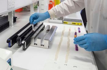 Clinical support technician Douglas Condie extracts viruses from swab samples so that the genetic structure of a virus can be analysed and identified in the coronavirus testing laboratory at Glasgow Royal Infirmary, Glasgow.