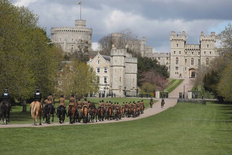 The King's Troop Royal Horse Artillery move up the Long Walk, Windsor Castle, Berkshire, during a rehearsal for the funeral of the Duke of Edinburgh. Picture date: Thursday April 15, 2021.