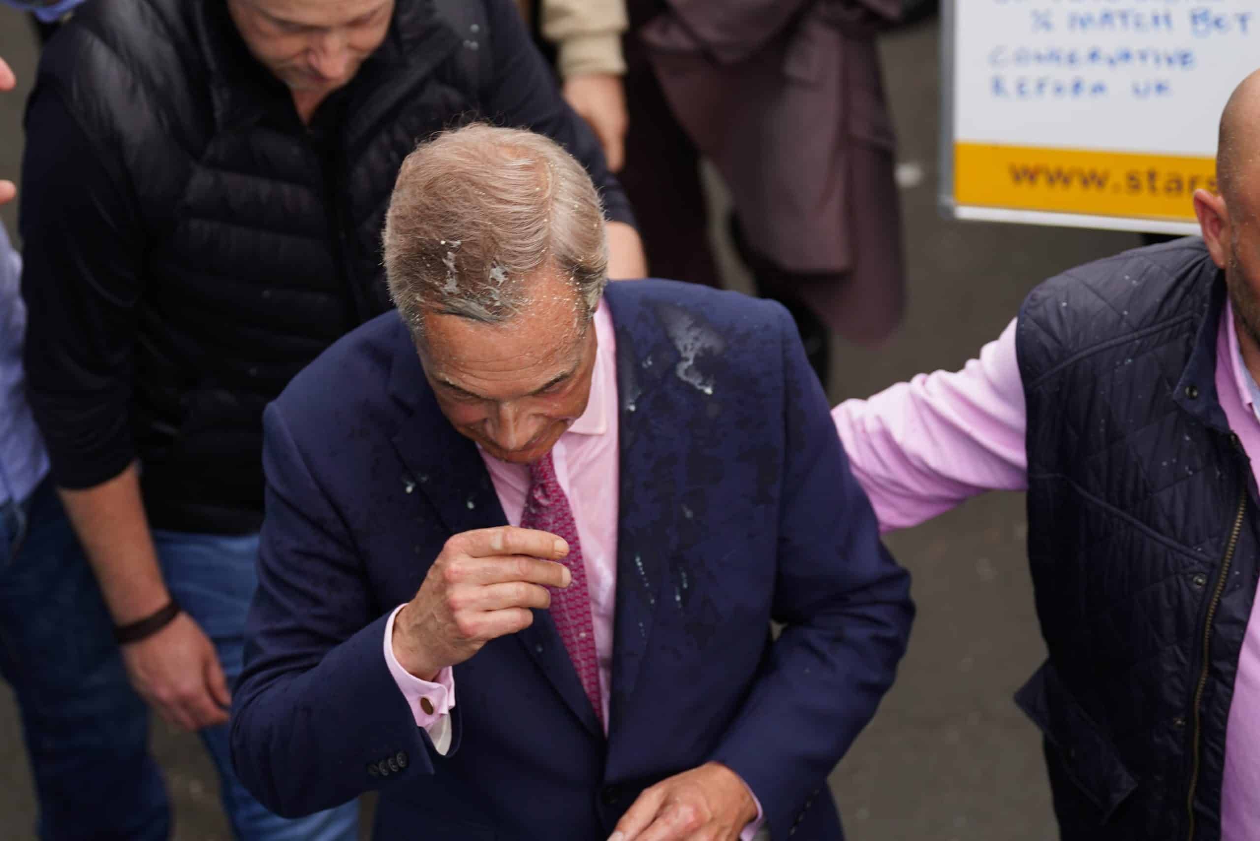 25-year-old woman arrested after throwing milkshake over Nigel Farage