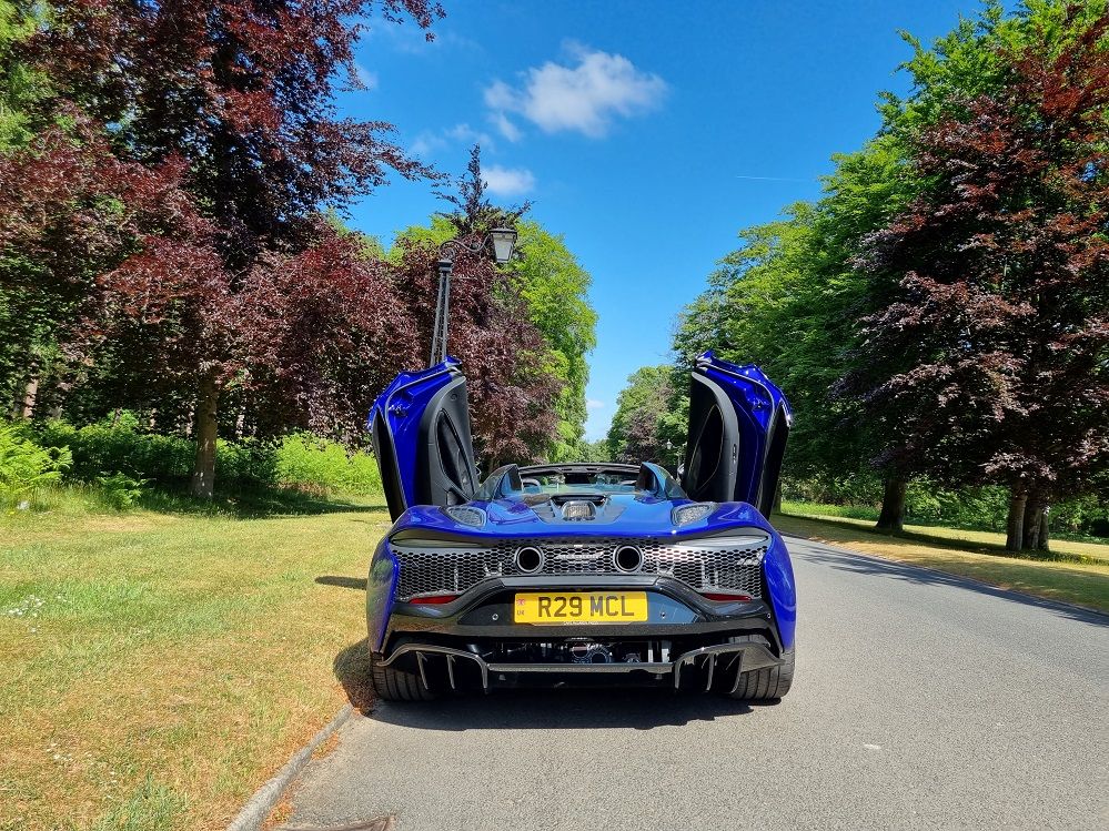 McLaren Artura Spider rear view with dihedral doors open