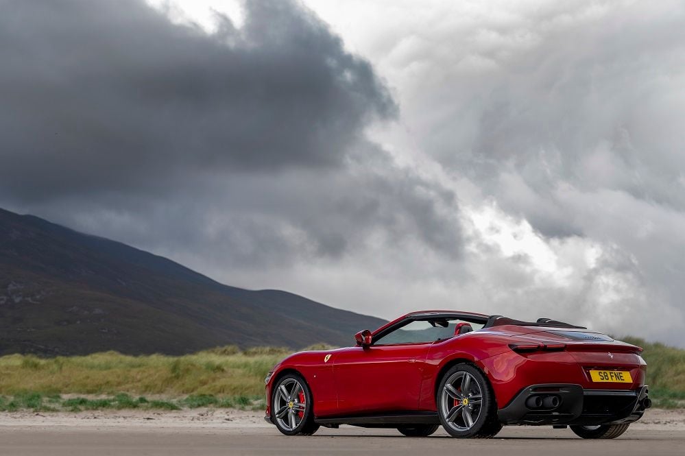 Ferrari Roma Spider roof down rear angle