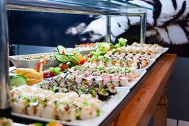 Photo by Israel França: https://www.pexels.com/photo/sushi-on-white-plates-on-brown-wooden-table-2264036/
