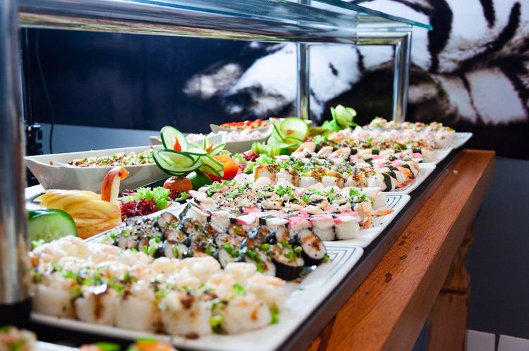 Photo by Israel França: https://www.pexels.com/photo/sushi-on-white-plates-on-brown-wooden-table-2264036/