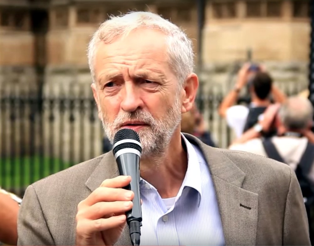 VIDEO – ‘Tracksuits are back!’ Corbyn makes a joke at his famous shell suit