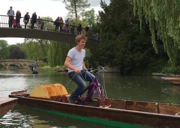 Barnaby Walker, 22 on his pedal powered punt. See Masons copy MNPUNT: An engineering student has invented a new way of powering a traditional river punt - by pedal power. Barnaby Walker, 22, took up the challenge from his supervisor after trying to find new ways of powering a punt and came up with the 'puntcycle'. The Cambridge University student converted an unloved old punt into a sleek, two-wheeled speed machine - capable of leaving all other river-users in his wake. He decided to breathe new life into French Hen, a punt which was a year older than himself, and rescued it after being beached for three years.