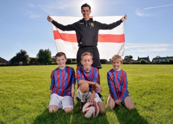PE teacher Sam Chambers, 24 from Weeden Bec Primary School near Northampton pictured with three of his players (from left: Will, Joe and Ewan. See Masons copy MNFOOTBALL: An unbeaten under-12s primary school football coach has applied for the England job and says he'd take it "depending on how much money they offered".  If he got to the big spot, the ambitious football coach said his first port of call would be to "take the boys out for a cheeky Nando's-anyone who cannot deal with Extra Hot is not playing for me". Although it was a shame to lose Sam Allardyce, Sam Chambers said it just proved that the FA had appointed the wrong Sam first time around and is convinced he's the man for the top job. Ladbrokes gave him 1,000-1 odds of getting the top job after his first application for the job following the stepping down of Roy Hodgson.