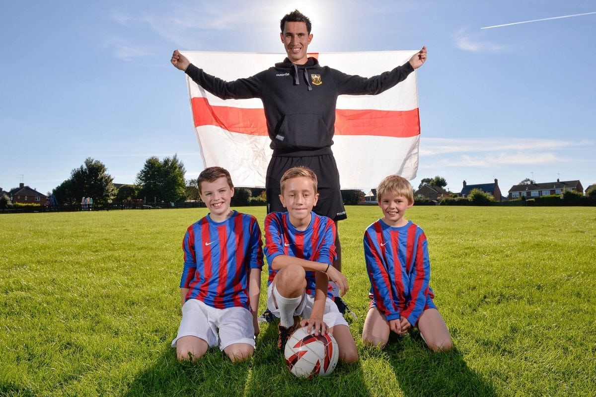 PE teacher Sam Chambers, 24 from Weeden Bec Primary School near Northampton pictured with three of his players (from left: Will, Joe and Ewan. See Masons copy MNFOOTBALL: An unbeaten under-12s primary school football coach has applied for the England job and says he'd take it "depending on how much money they offered".  If he got to the big spot, the ambitious football coach said his first port of call would be to "take the boys out for a cheeky Nando's-anyone who cannot deal with Extra Hot is not playing for me". Although it was a shame to lose Sam Allardyce, Sam Chambers said it just proved that the FA had appointed the wrong Sam first time around and is convinced he's the man for the top job. Ladbrokes gave him 1,000-1 odds of getting the top job after his first application for the job following the stepping down of Roy Hodgson.