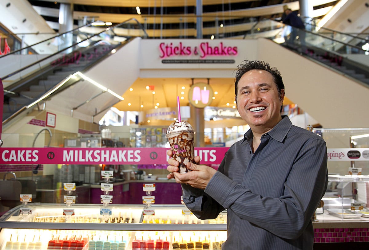 Owner Mark Glassman poses with a "Cookie Overload" milkshake at Sticks & Shakes in the Fashion Show Mall Tuesday, Jan. 13, 2015. The kiosk sells frozen gelato and sorbet on a stick as well as customized milkshakes. The company also has a location at the Galleria Mall in Henderson.