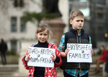 Louis, 10, and Margaux, 7, join pro migrant campaigners march to Westminster on #1daywithoutus a day of action where migrant workers are not going to work to show their contribution to society, February 20 2017. Hate and blame has been increasingly directed at migrants from many sections of politics and the general public.