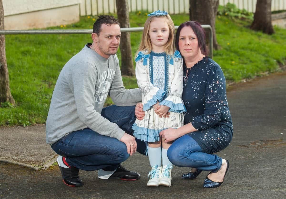 Martin and Sarah Tall with their daughter Roxanne aged four, at their home in Plymouth, Deovn. 21/03/2017  See SWNS story SWFAT; Furious parents have condemned the NHS and fear their kids could develop eating disorders after being told they are overweight - at the age of FOUR. Letters have been sent home to several families of reception pupils from Tor Bridge Primary School telling them the youngsters need to shift the pounds. They were assessed by school nurses as part of a Government monitoring scheme and were all judged to be above the recommended weight.