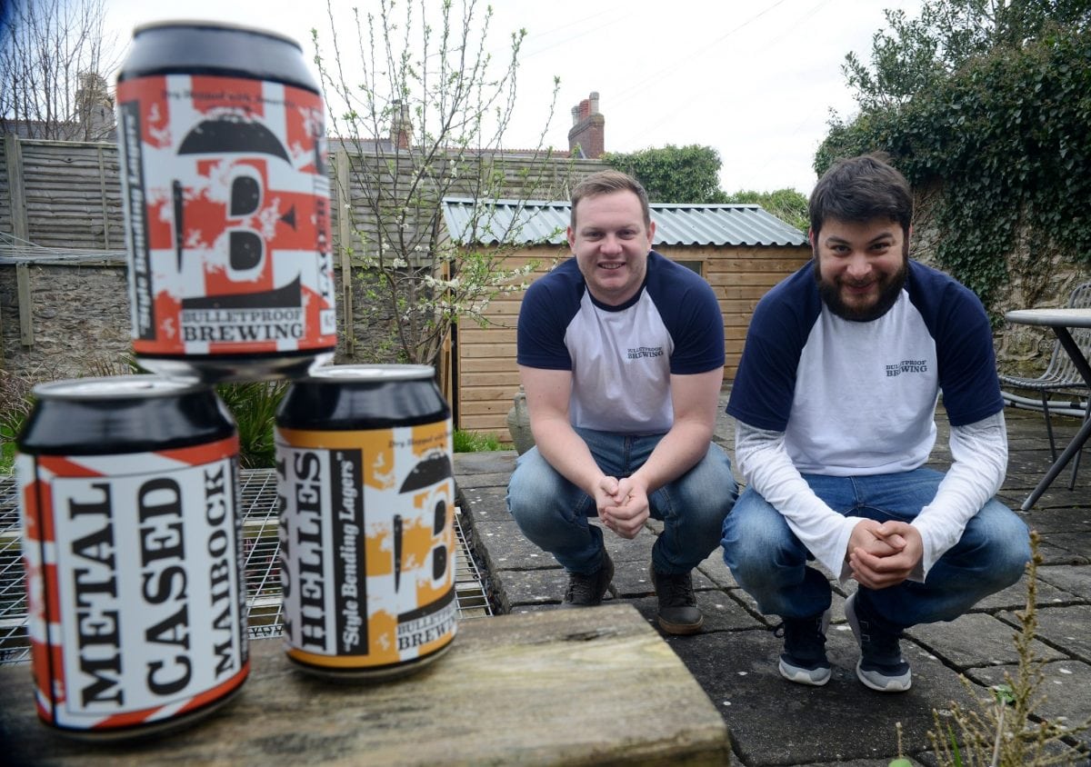 Patrick Lawrence (right) and Connor Johnson who run a micro brewery business from a garden shed. See SWNS story SWSHED; It gives the term beer garden a whole new meaning - Plymouth's newest microbrewery is in a backyard shed. The Bulletproof Brew Co has been created in the back garden of liquor entrepreneur Patrick Lawrence's mum's city centre house. And it's pumping out 400 litres of German-style craft lager every week. That's 1,200 "stubby" 330ml cans – the container of choice for the emerging craft beer industry. Mr Lawrence and co-director Connor Johnson now want to grow the one-year-old firm – because they are already having problems meeting demand.