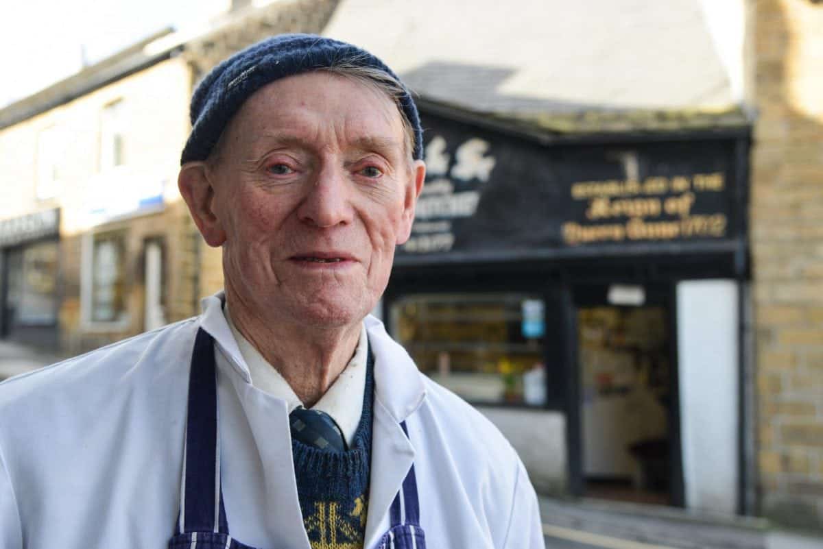 Frank Fisher, 87, is one of the oldest butchers in the country, but is uncertain of his shops future, pictured there near Sheffield, South Yorks., March 21 2017. See Ross Parry story RPYOLD: Britains oldest butcher who is the fourth generation to run the family business fears his dynasty is facing the chop - as he has no heirs to take over his lifes work. Dedicated Frank Fisher, 87, still works full time six days a week to keep the shop going. And although he is not yet ready to pin up his apron, he fears that once when he retires the business will go with him. The bachelor is the fourth of his generation to run the butchers, Fisher and Son Family Butcher's.