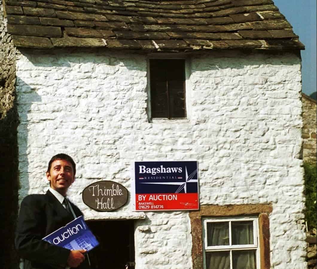 Mark Bramell from estate agents Bagshaws.  Derbyshire is home to a property once listed as the smallest detached house in Britain - Thimble Hall in Youlgreave.  See NTI story NTITHIMBLE.  It dates back to 1756 and measures just 11ft 10in x 10 ft 3in and stands 12 ft 2in high. Stretch out your arms and you practically touch either side of the rooms.  In August 2000, the Guinness Book of Records proclaimed it the smallest detached property in Great Britain. And yet 100 years ago, a family of eight lived there.  Such is its quirkiness, when it went up for auction in 1999 it sparked bids from all over the world including Hong Kong, Athens and New York. It's claimed there was even an offer from Uri Geller.