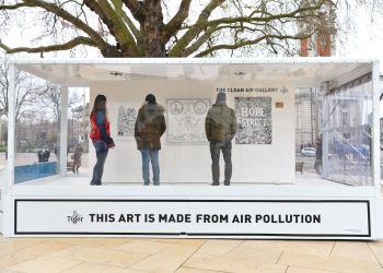 EDITORIAL USE ONLY
Visitors look at artworks inside the Tiger Beer ‘Clean Air Gallery’ in Brixton, the works were created using Air-Ink™, the first ink to be made from captured air pollution before it enters the atmosphere. London. PRESS ASSOCIATION Photo. Picture date: Monday March 27, 2017. Photo credit should read: Matt Crossick/PA Wire