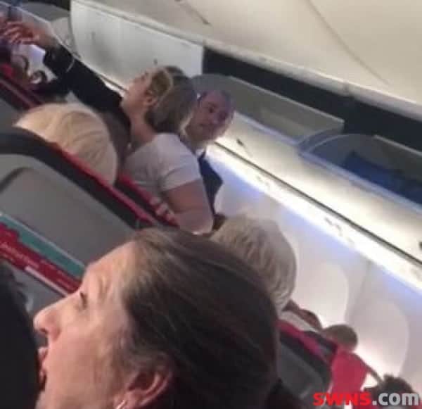 Watch – Charming! Drunken hen party reveller picks fight with bride to be on plane