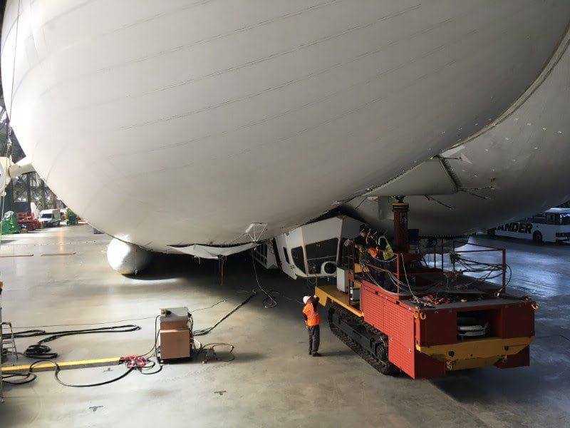 The Airlander which has been given giant inflatable landing feet. See Masons copy MNAIRCRAFT: The world's largest aircraft has been given a pair of "giant inflatable landing feet" after crashing when it got caught in power lines. The £25m Airlander 10, airship,  dubbed the 'giant bum' due to its appearance, nose-dived during a test flight last year. No-one was injured in the accident at Cardington Airfield, Beds., on August 24, but the cockpit was effectively destroyed.