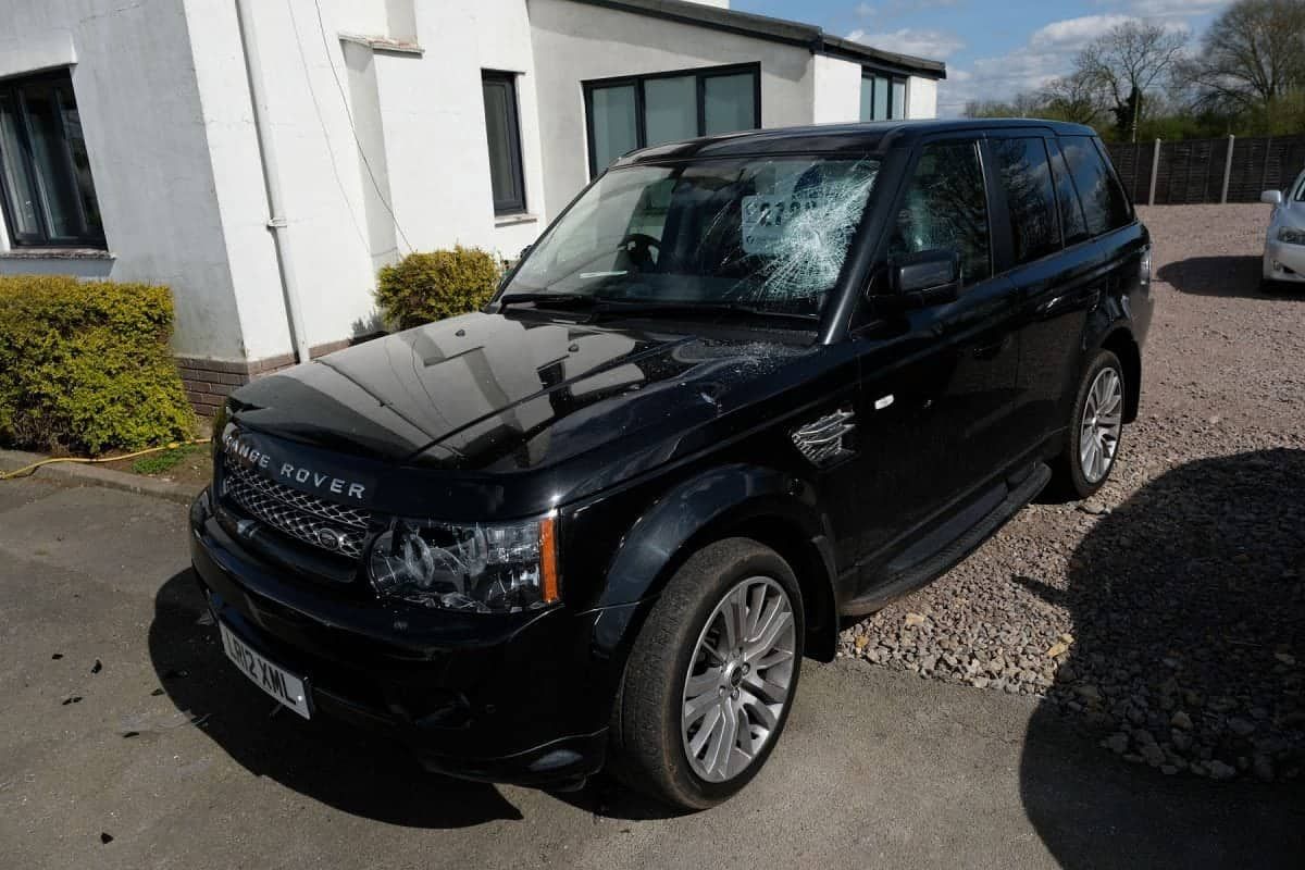 Yobs with sledgehammer cause hundreds of thousands of pounds worth of damage at car dealership