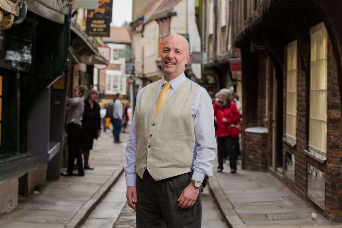 David Leckie, 58, of York, on York's iconic Shambles street. Mr. Leckie, a therapist and mediator, has launched the Divorce Hotel service, where couples can come to a harmonious settlement over the course of a weekend. April 17, 2017.