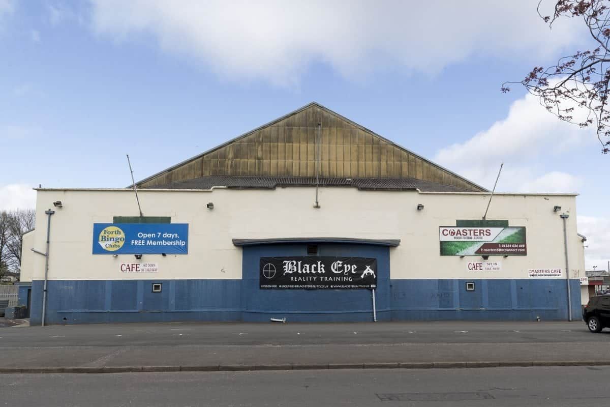 GV of Black Eye Reality shooting banner hanging outside Coasters building in Falkirk. See Centre Press story CPRANGE; The father of a victim of the devastating school shooting in Dunblane has hit out at plans for a shooting range which will use automatic weapons. The mass-shooting at Dunblane Primary School, Stirling, killed 16 children and one teacher in 1996 and led to a ban on handguns across much of the UK.  Doctor Mick North lost his five-year-old daughter Sophie in shooting and has been left devastated by plans for a shooting range to open in Falkirk – only 20 miles away from the scene of one of the country’s worst tragedies. Black Eye Reality are seeking an entertainment license from Falkirk Council to operate the range which will allow customers to get their hands on deactivated rifles, pump action shotguns and Glock pistols.