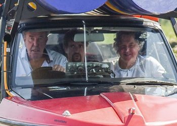 Jeremy Clarkson, accompanied by co-presenters Richard Hammond (in the back seat) and James May (in the front passenger seat), drives an odd vehicle in the outskirts of Huddersfield, West Yorks., May 25 2017. The car appears to be part boat, part car, and part jet engine, and filming has severly disrupted residents in the local village. See Ross Parry story RPYTOUR: