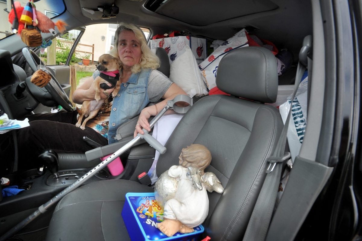 Ex-nurse is living in car and eating DOG FOOD due to cuts in her disability benefits
