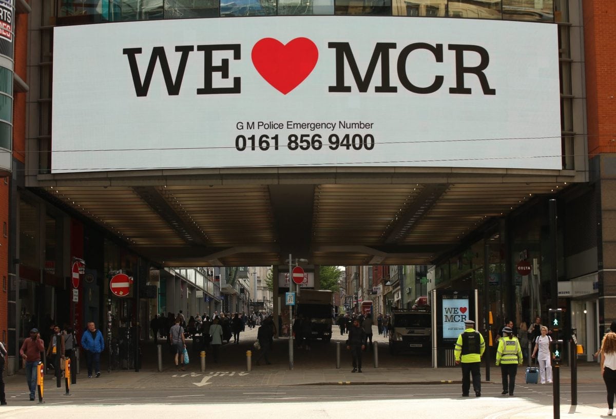 We Love Manchester signs have begun to pop up around the city to show solidarity and to share a helpline for those effected by last nights terror attack in the city. At least 22 people have died, with more than 60 injured after an 'explosion' tore through a pop concert at Manchester Arena in a suspected terror attack. In a statement, GMP said: "This is currently being treated as a terrorist incident until police know otherwise." Officers were called to reports of an explosion at the Manchester Arena just before 10.35pm on Monday, May 22. "So far 19 people have been confirmed dead, with around 50 others injured," the force said. Multiple witnesses reported hearing two "huge bangs" at the venue shortly after US singer's gig finished at around 10.30pm on Monday evening. The area around the arena was swamped with police and emergency services and approach roads were cordoned off.
