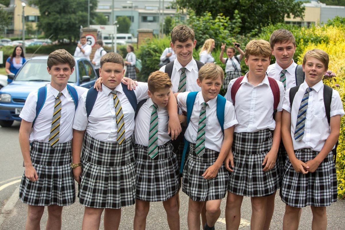 Watch – Schoolboys wear skirts in protest of “no shorts” policy during sweltering heat