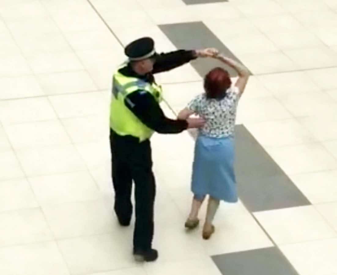 WATCH – Police officer filmed waltzing with sprightly pensioner in a shopping centre