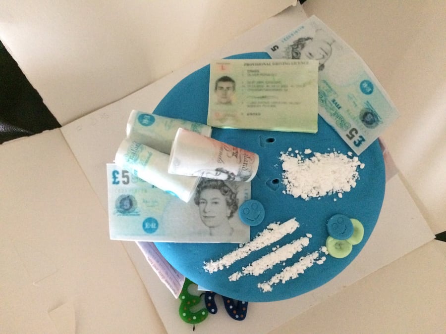 Cocaine-themed birthday cake – complete with fake lines of coke and rolled up £50 notes, made for woman’s boyfriend 