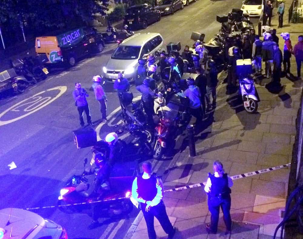 The scene at 22:25opm July 13 2017 on the Hackney Road junction with Queensbridge Road after reports of a serial acid attacker. See National News story NNACID; A man left with 'life changing' injuries following a spate of acid attack robberies was left screaming in agony as dozens of people rushed into the street to try and help him, witnesses said. He was targeted in a suspected robbery last night (Thurs) during a series of five attacks by men on a moped across north London in just 72 minutes, which police believe are linked. A major investigation has now been launched and a teenager has been arrested in connection with the attacks. The most serious has left a man with 'life-changing injuries', detectives said.