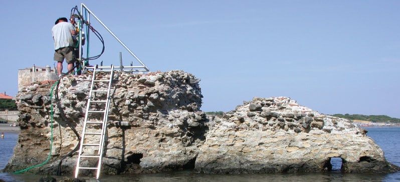 ***EMBARGOED UNTIL 6PM BST, MON JULY 3RD (17.00 GMT)*** 

Samples from this Ancient Roman pier, Portus Cosanus in Orbetello, Italy, were studied with X-rays at Berkeley Lab. See National story NNCONCRETE; Ancient Roman buildings have survived thousands of years relatively intact because they made concrete from seawater, according to new research. And the study suggests the ancient recipe could help modern builders create structures to stand the test of time - while reducing global warming. The research shows that the iconic Colosseum, the Pantheon and Trajan's Markets survive today because ancient Romans made concrete out of seawater. An analysis of 2,000 year old cement made from volcanic ash and limestone suggests seawater was the secret ingredient.