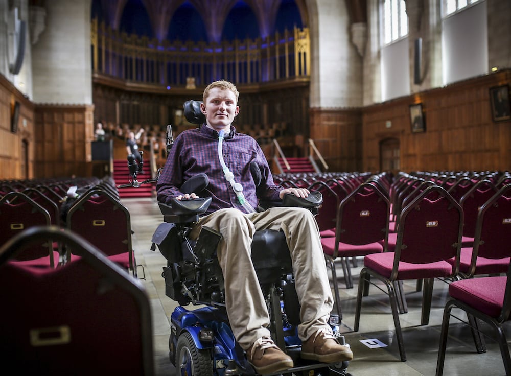 Rob Camm, who suffers from tetraplegia and is graduating from Bristol University with a first class degree. See SWNS story SWUNI: A student who is paralysed from neck down in a car crash has overcome the odds to graduate with first class honours from Bristol University. As new graduates grace the stage in Wills Memorial Building today, Rob Camm will join them in reaching yet another milestone in his life. The 23-year-old will graduate with a BSc in politics and philosophy, and will be welcomed with cheers from friends and family. It is fair to say life has not always gone his way. In September 2013, rugby player Rob was two weeks away from going to university when he was involved in a crash.
