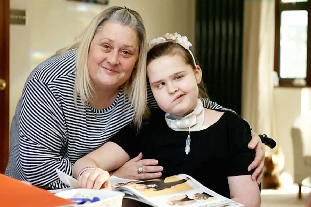 Emma Garbutt and her daughter Millie.  A young girl who lost her voice after brain tumour surgery can now only communicate using her iPad - and SIRI. See NATIONAL story NNIPAD.  Millie Garbutt was left unable to speak after having a life-saving tracheotomy after doctors operated on a brain tumour.  Now the 12-year-old has to communicate using the text-to-speech function on her tablet computer - that uses the same voice as Apple's 'virtual assistant' Siri.  Mum Emma Garbutt said: "She has an iPad and another electronic device which attaches to her wheelchair and helps her communicate with everyone.