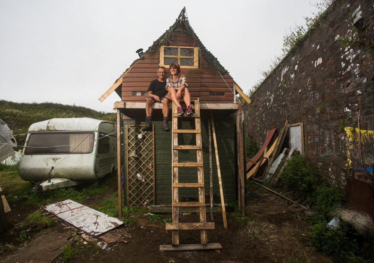 Couple spend just £1,200 a year living in off-grid hilltop coastal fort