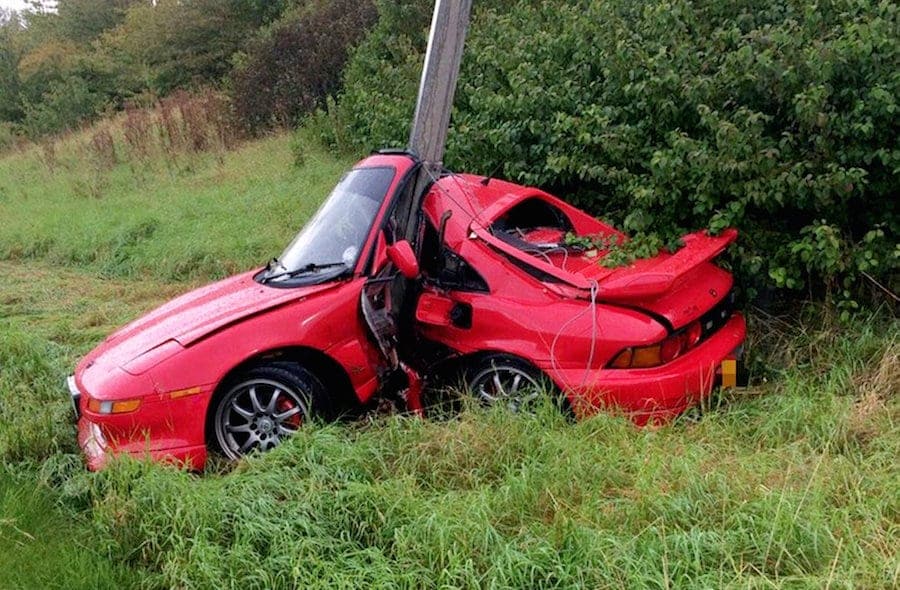 Driver lucky to be alive after wrapping car around a lamppost