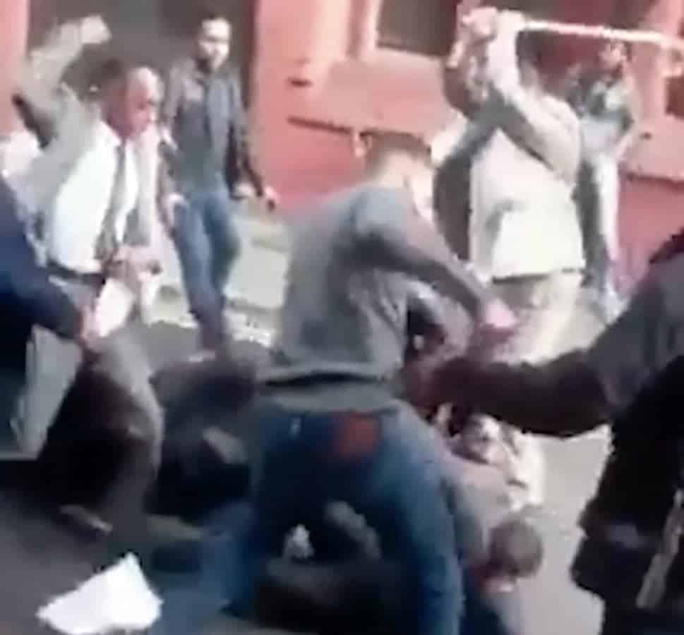 Watch – Shocking footage shows twenty-man mass brawl after violence erupts outside magistrates court