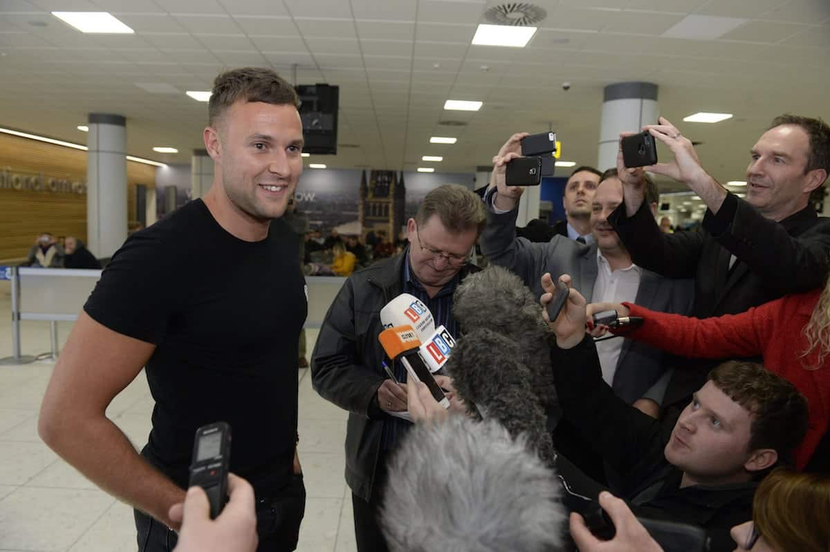 Jamie Harron arrives back in Scotland at Glasgow airport after being released from jail in Dubai