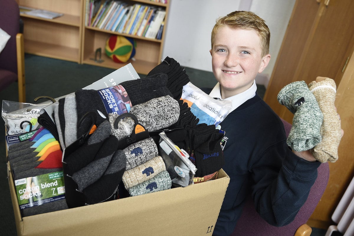 11-year-old boy has started a charity project to collect new socks and underwear for the homeless