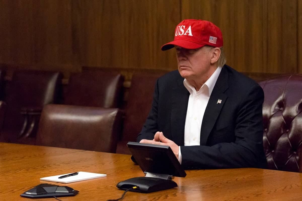 Statue of Trump tweeting on the toilet takes centre stage as protests begin