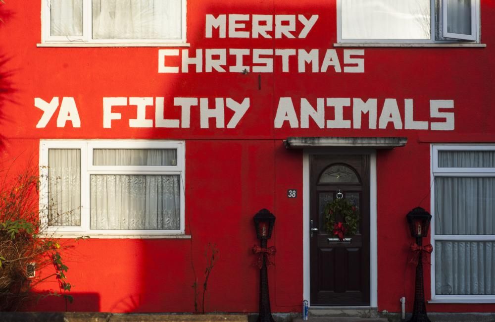 Family spark row with festive display featuring Home Alone quote – ‘Merry Christmas ya filthy animals’